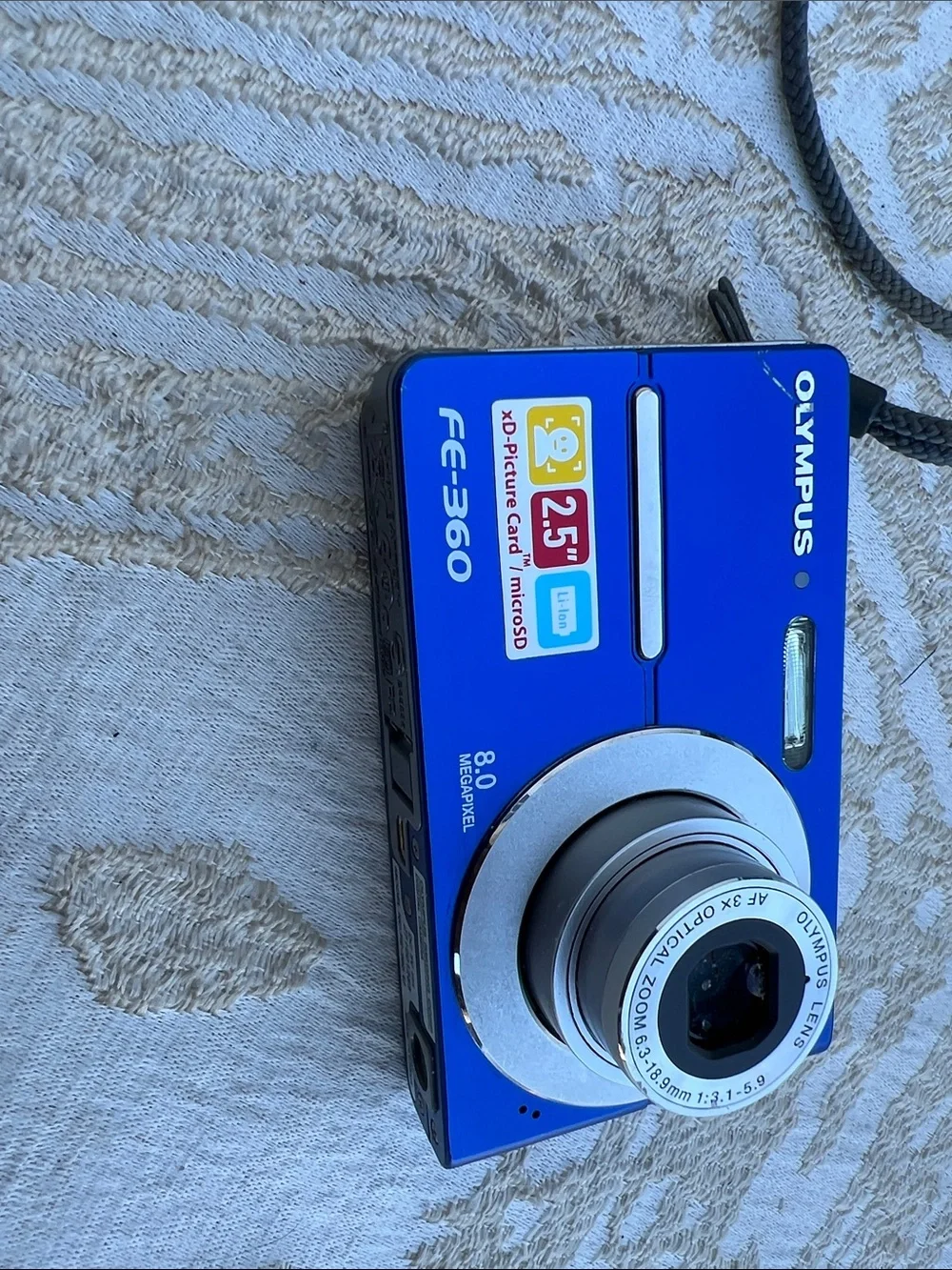 Olympus 8.0 Megapixel FE-360 Camera with accessories.